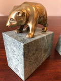 Solid Brass Bulls and Bears Bookends on Green Marble Bases, a Pair