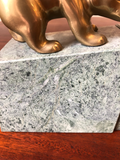 Solid Brass Bulls and Bears Bookends on Green Marble Bases, a Pair