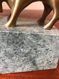 Solid Brass Bulls and Bears Bookends on Green Marble Bases, a Pair
