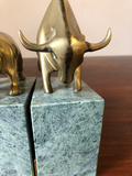 Solid Brass Bulls and Bears Bookends on Green Marble Bases, a Pair