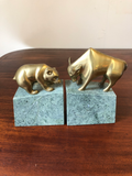 Solid Brass Bulls and Bears Bookends on Green Marble Bases, a Pair